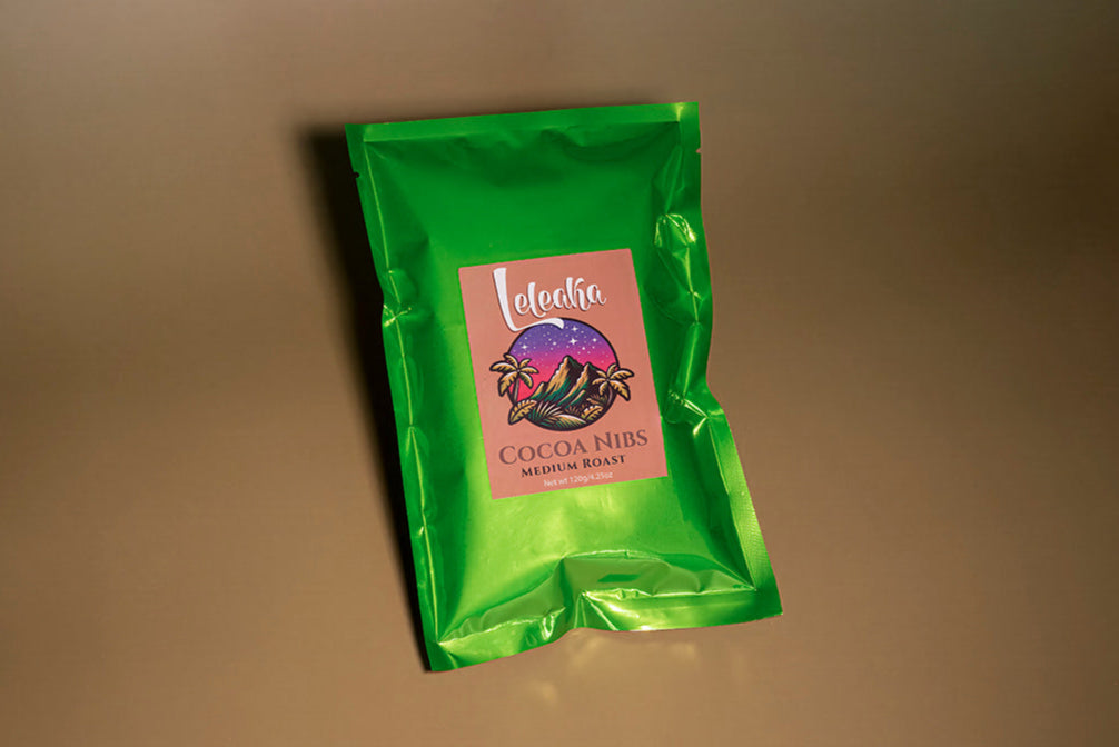 Shiny green pouch containing medium roast cocoa nibs